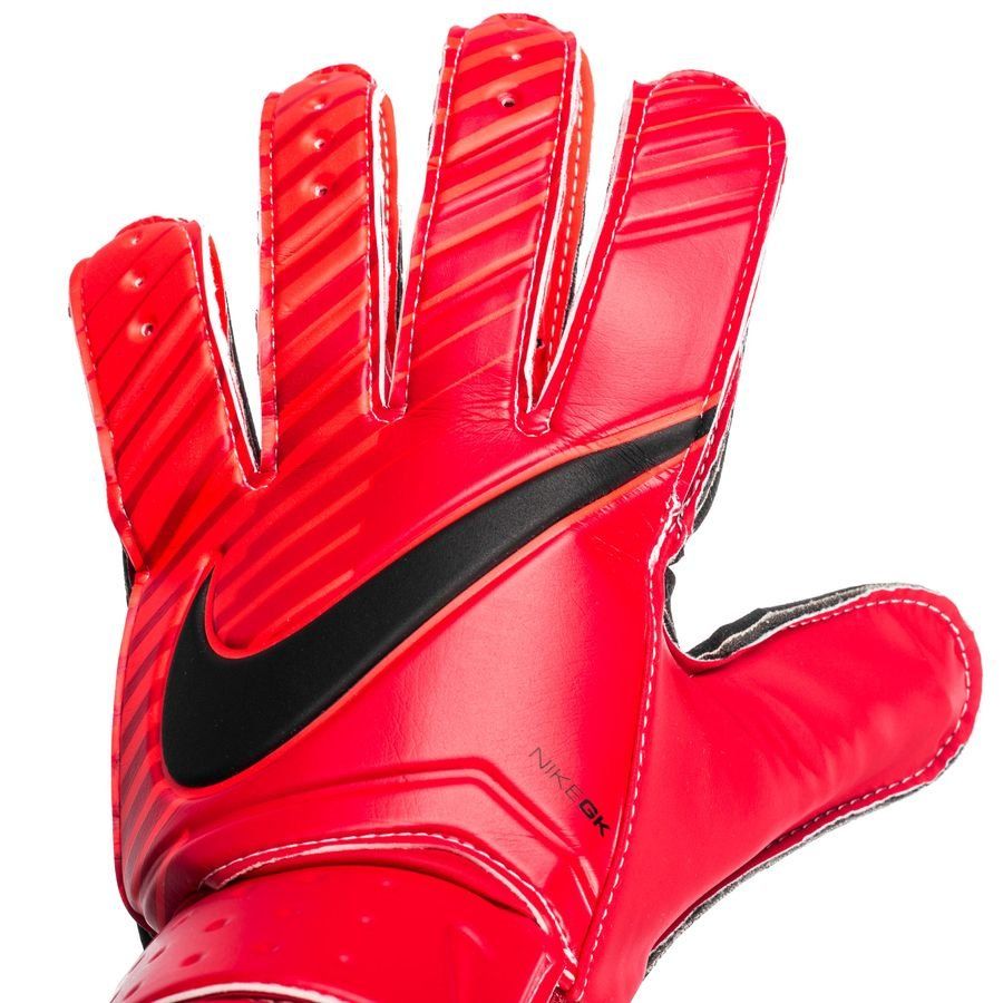 Guantes de portero Nike Match de color rojo y carmesí.