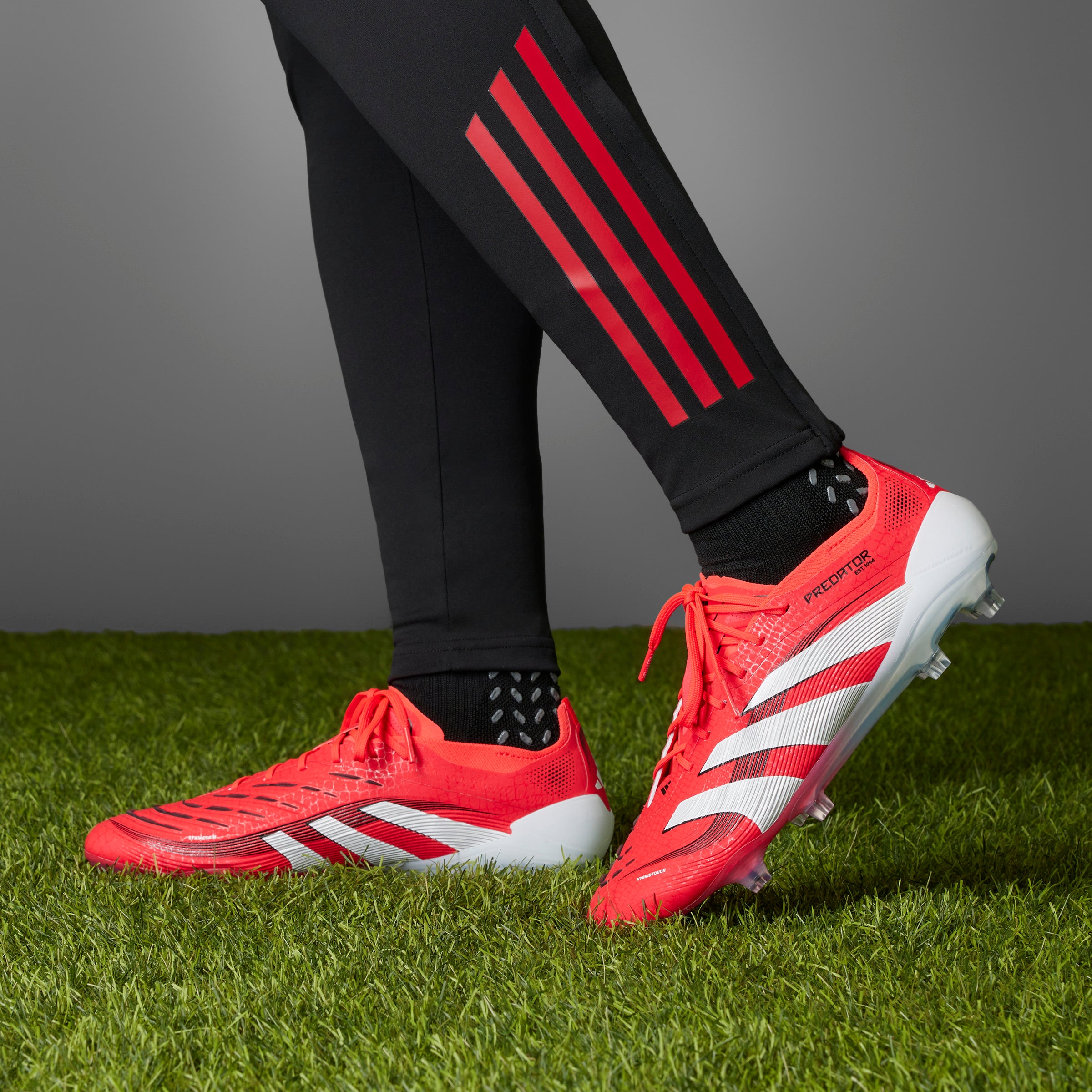 Botas de fútbol para terreno firme adidas Predator Elite en rojo y blanco